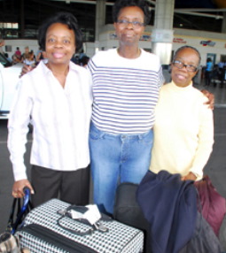 Sisters (left to right) Jessie not home since 1978, Wavanie who returns regularly, and Shirley Edwards not home since 1995, are eager to see the changes in Barbados' landscape.  